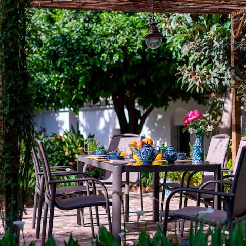 Escape the hustle and bustle of the city in the home's private gardens