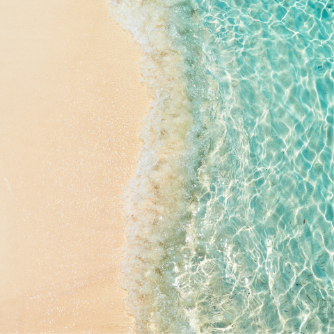 Dive into the warm ocean waters, only 600 metres away