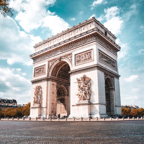 Admire the iconic Arc de Triomphe – it's two stops away on the metro
