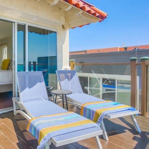 Soak up the sunshine from one of the loungers