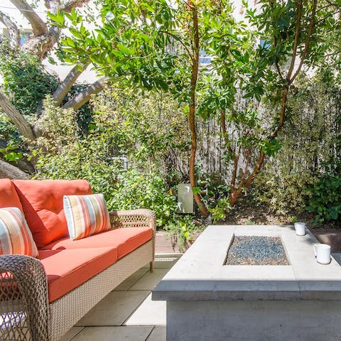 Turn the fire pit on in the evening and sit out around the flames