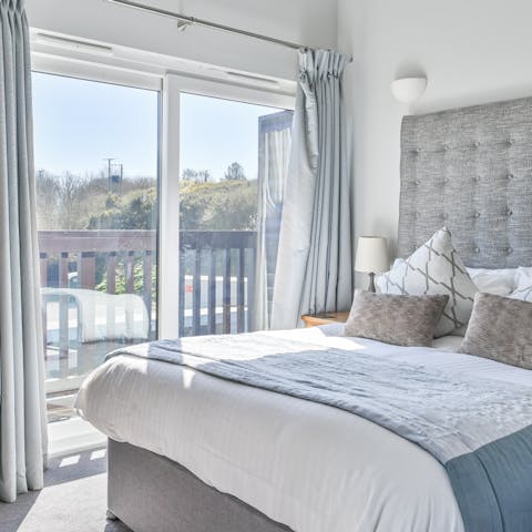 Wake up to sunlight streaming in through the sliding doors each morning