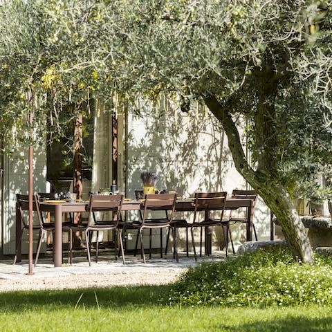 Share a bottle of French wine over lunch on the terrace