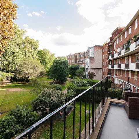 Take in the evening sun from the balcony overlooking the park