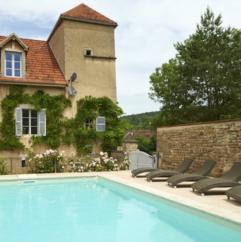 The updated, century's old building also has a private pool
