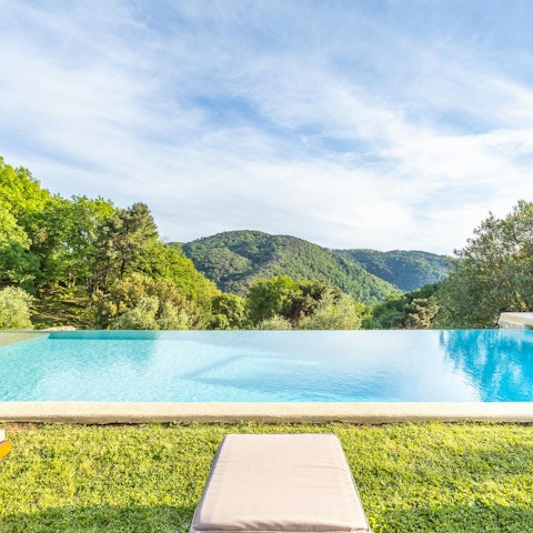 Enjoy incredible views while lounging by the pool