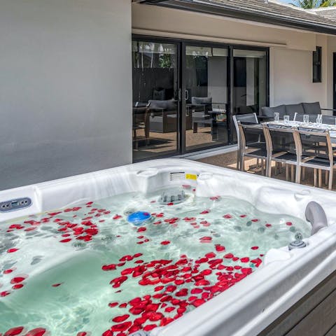 Enjoy drinks and a long sunset soak in the Jacuzzi