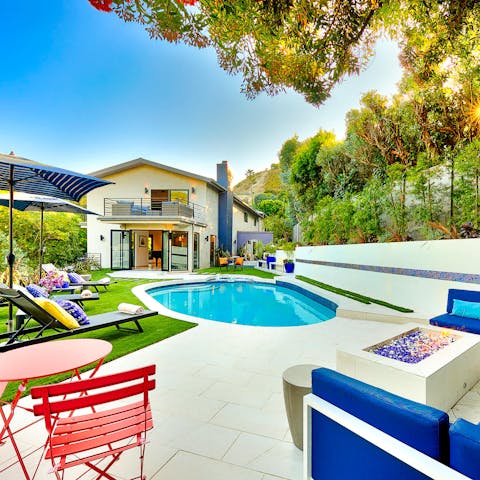 Find peace and relaxation while lounging by the pool