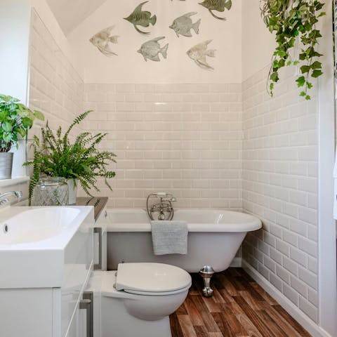 Soak in the roll top bath, glass of bubbles in hand