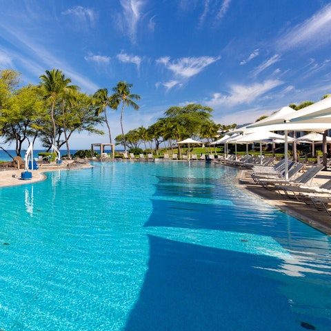 Take a refreshing dip in the shared swimming pool