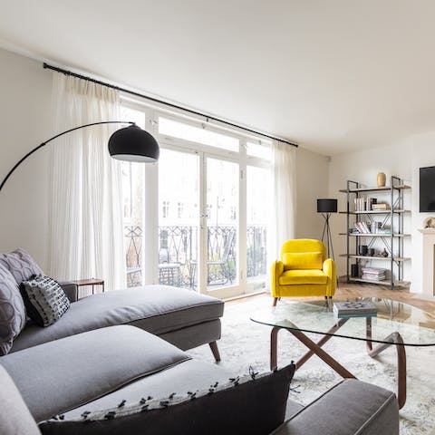 Open up the sitting room’s French doors onto the private balcony