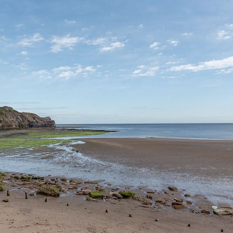 Go for morning strolls along Sandsend Beach, a fifteen-minute walk away