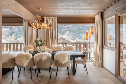 Gather under an antler chandelier with mountain views as your backdrop