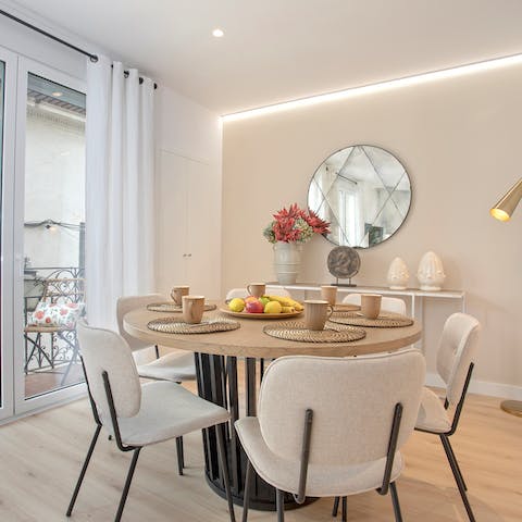 Gather around your chic dining table for dinners, drinks, and card games at home