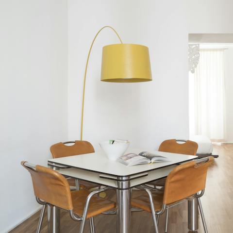 Sip your morning coffee at the Joe Colombo Poker Table