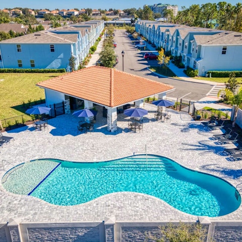 Go for a swim in the larger, shared pool on site