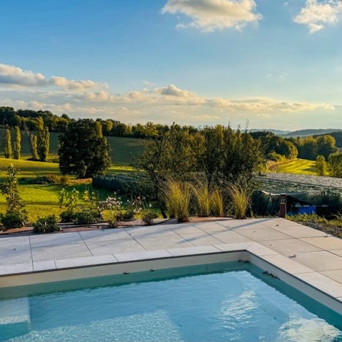 Admire stunning countryside views from the private heated pool