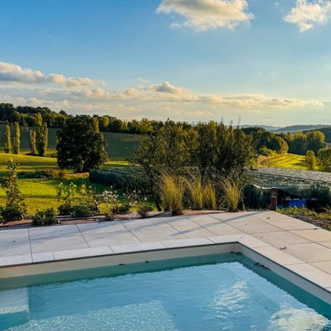 Admire stunning countryside views from the private heated pool