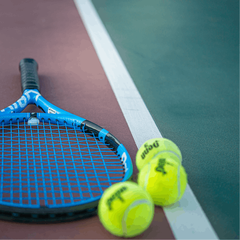 Channel your inner Andy Murray on the shared tennis courts