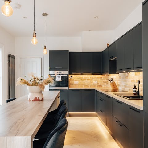 Prepare family meals in the sleek, modern kitchen