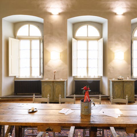 Plot the day's activities at the big wooden dining table