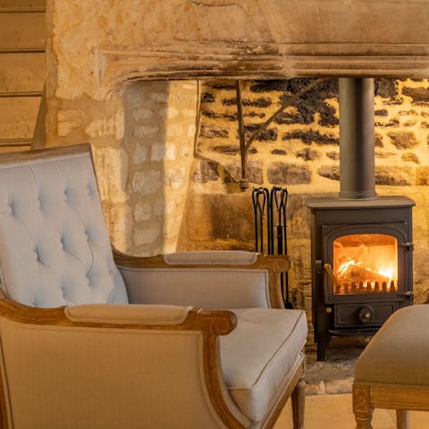 Sip a glass of wine beside the fire