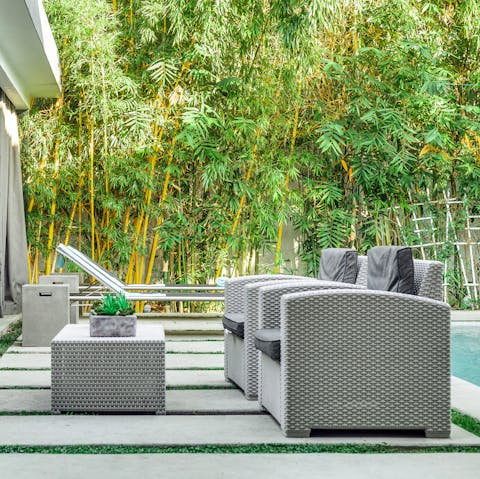 Pop open a bottle of fizz and relax on the patio