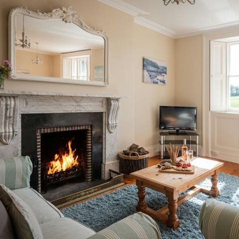Get cosy with a hot chocolate around the fireplace