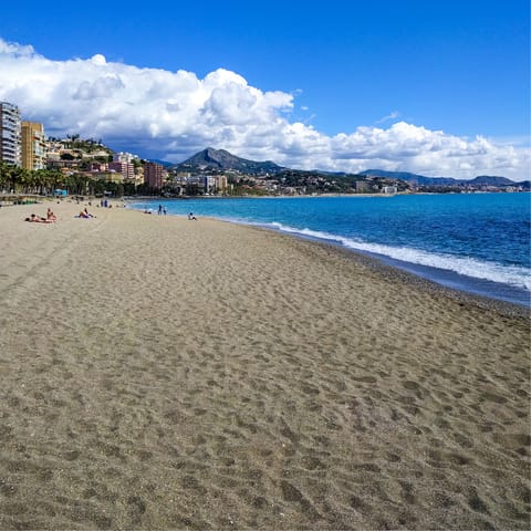 Spend the day at Malaga Beach, within a fifteen–minute drive away