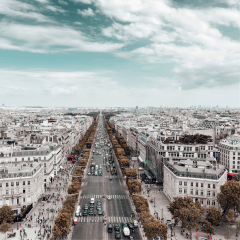 Go shopping at the designer fashion boutiques of the Champs-Élysées
