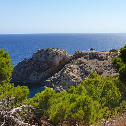 Swim the turquoise waters off Cala Varques, a short drive away