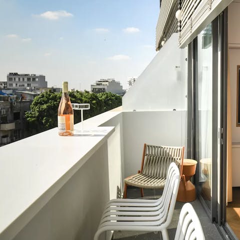 Relax with evening drinks on the balcony