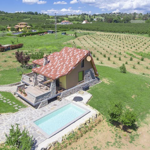Take a dip in the pool on a hot afternoon after exploring the fields nearby