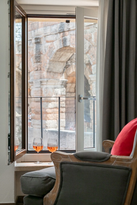 Wake to the ancient arches of the Arena di Verona