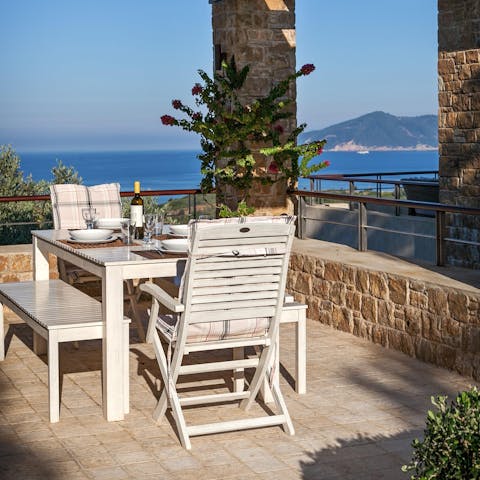 Share a bottle of wine and watch the incredible sunsets on the terrace