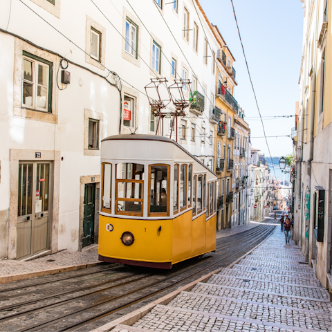 Take a break from climbing Lisbon's hills and hop on the Bica Funicular