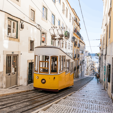 Take a break from climbing Lisbon's hills and hop on the Bica Funicular