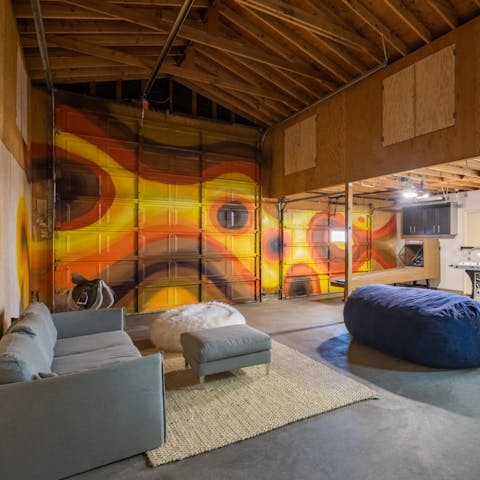 Hang out in the home arcade and challenge your friends to a foosball tournament