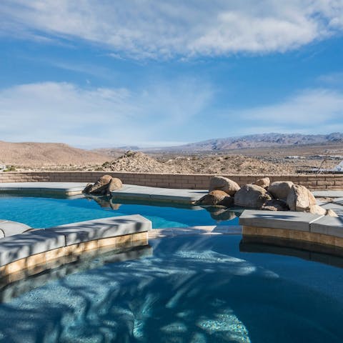 Cool off in the pool as you look out over the rugged landscape