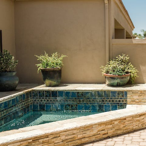 Sink into your very own bubbling spa pool