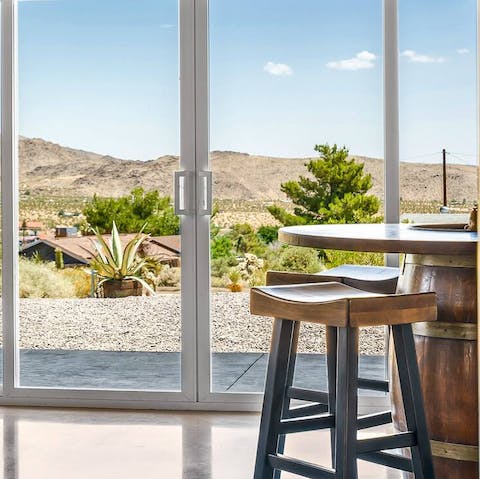 Admire the gorgeous views from the floor-to-ceiling windows