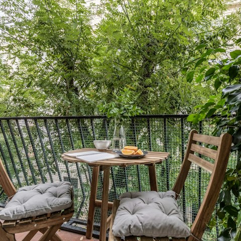 Catch up on the day's events over wine on the private balcony