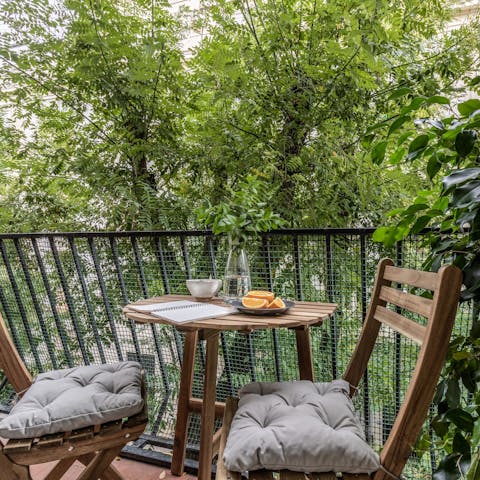 Catch up on the day's events over wine on the private balcony