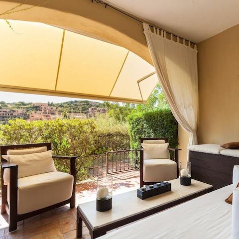 Chill with a glass of wine on the cosy terrace