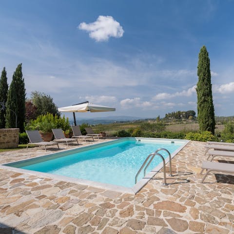 Dive into the depths of the private pool for a refreshing dip from the Tuscan sun