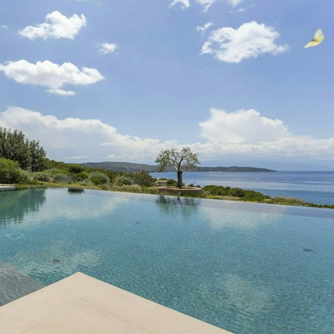 Float in the private pool and admire sea views