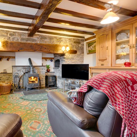 Warm your toes in front of the wood-burning stove at the end of a busy day