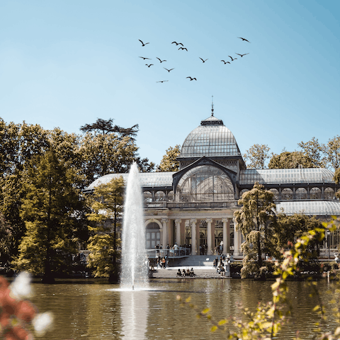 Spend the day exploring the lush Parque de El Retiro, seventeen minutes away