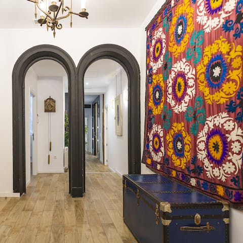 Admire original hanging artwork and vintage furnishings throughout the home