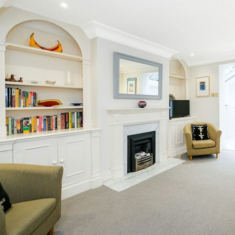 Wind down in the open plan living area with a family film or a good book